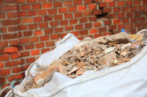 Professionals conducting flat clearance in Woolwich