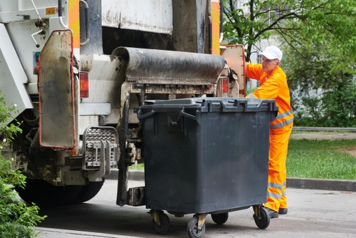Professionals performing garage clearance in Woolwich